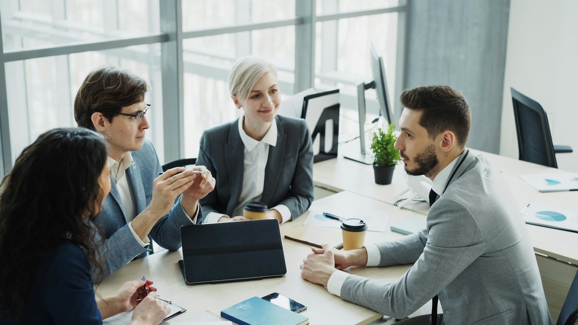Account team talking with a customer